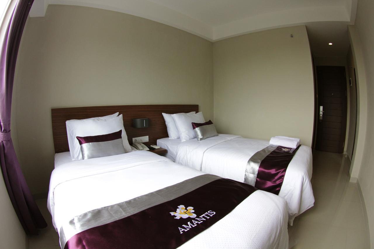 Amantis Hotel Demak Habitación foto